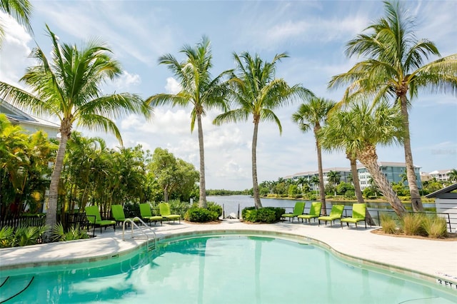 view of swimming pool featuring a patio area