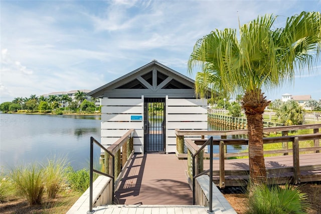 view of dock with a deck with water view