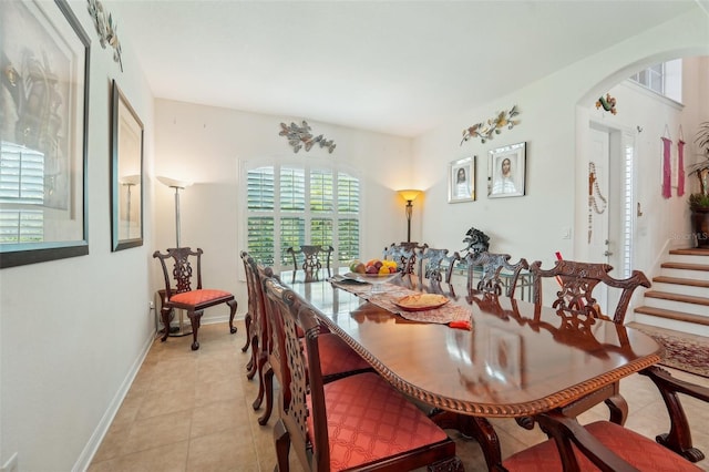 dining area with light tile flooring