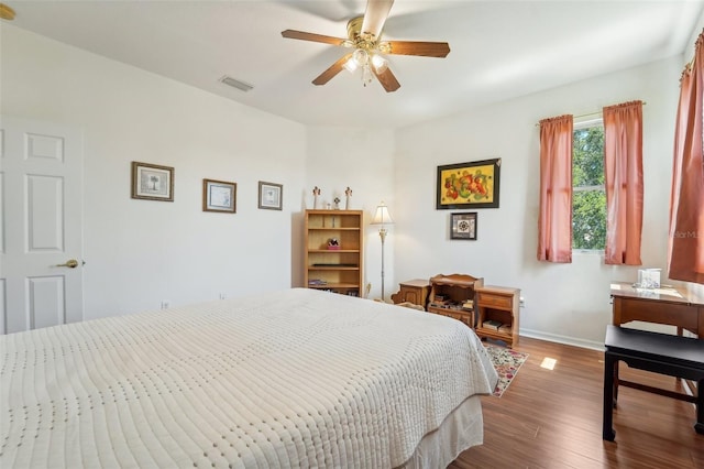 bedroom featuring wood-type flooring and ceiling fan