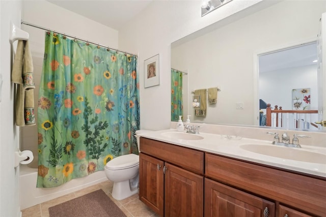 full bathroom featuring shower / tub combo, tile floors, large vanity, toilet, and dual sinks