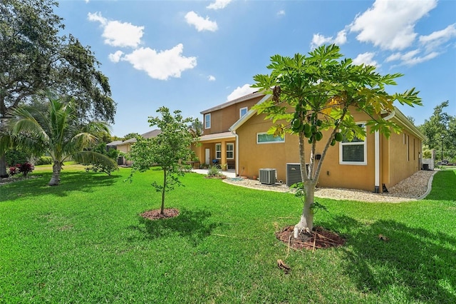 view of yard featuring central AC unit