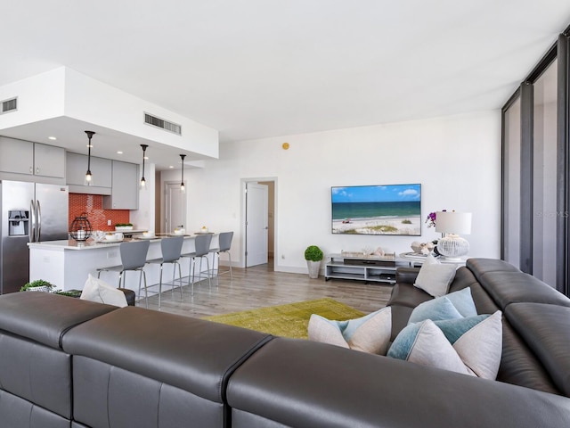 living room featuring expansive windows