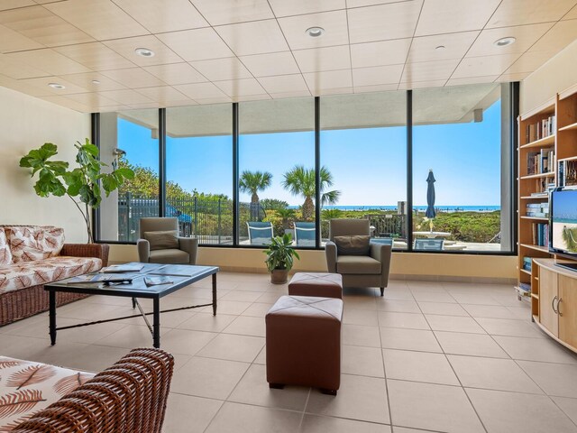 living room with light tile patterned flooring