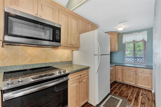 kitchen featuring light brown cabinets, appliances with stainless steel finishes, tasteful backsplash, and dark hardwood / wood-style floors