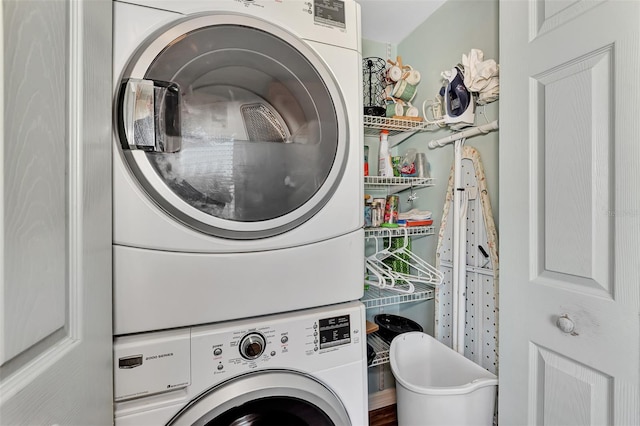 washroom with stacked washer and clothes dryer