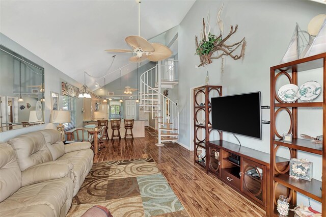 living room with high vaulted ceiling, ceiling fan, and wood-type flooring