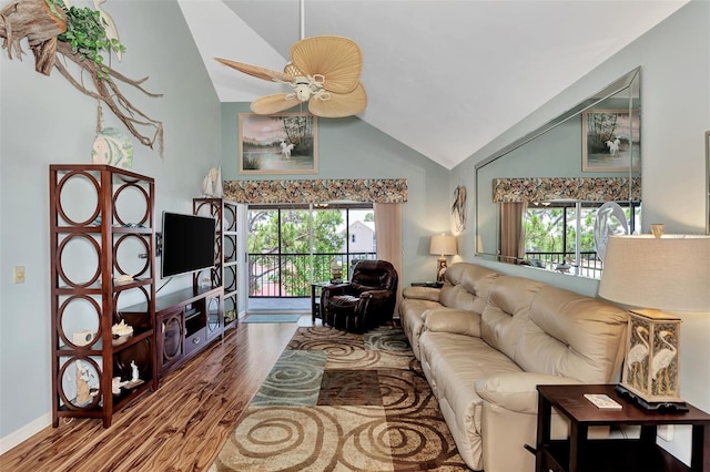 living room featuring high vaulted ceiling, ceiling fan, and hardwood / wood-style flooring