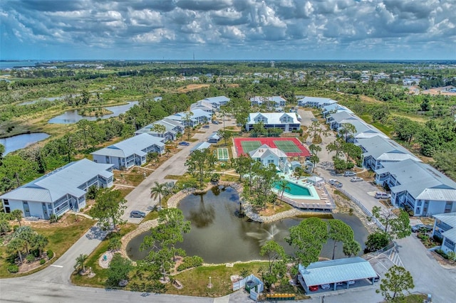 bird's eye view with a water view