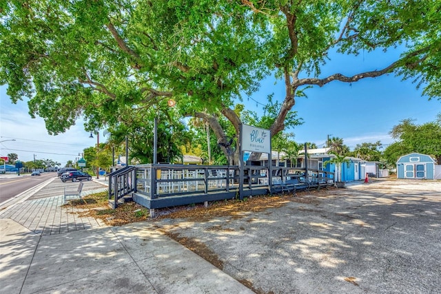 view of front of home with a storage unit