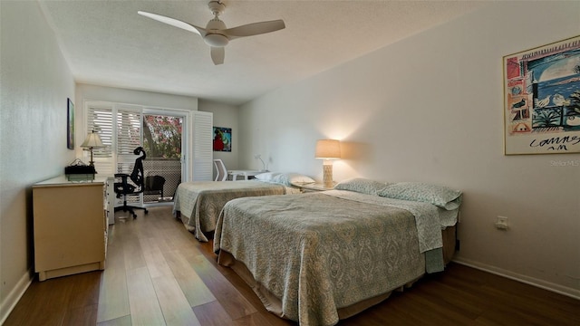 bedroom featuring ceiling fan and hardwood / wood-style flooring