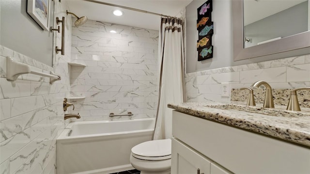 full bathroom with vanity, toilet, tile walls, and shower / tub combo with curtain