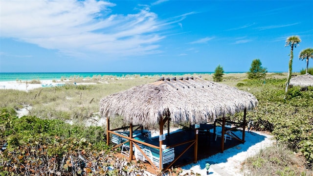 water view featuring a gazebo and a view of the beach