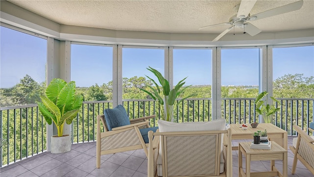 sunroom / solarium with ceiling fan and a wealth of natural light