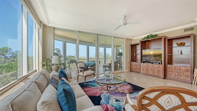 sunroom with ceiling fan and plenty of natural light