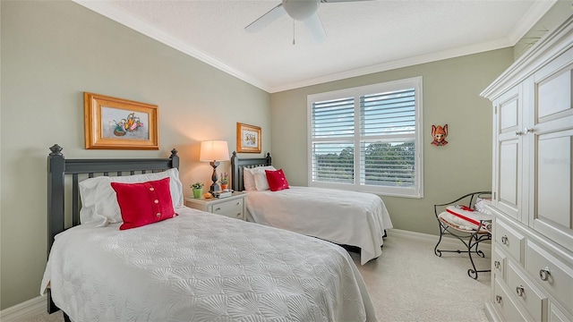 bedroom featuring ornamental molding, ceiling fan, and light carpet