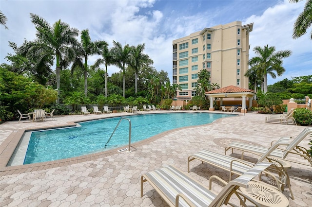 view of swimming pool with a gazebo and a patio