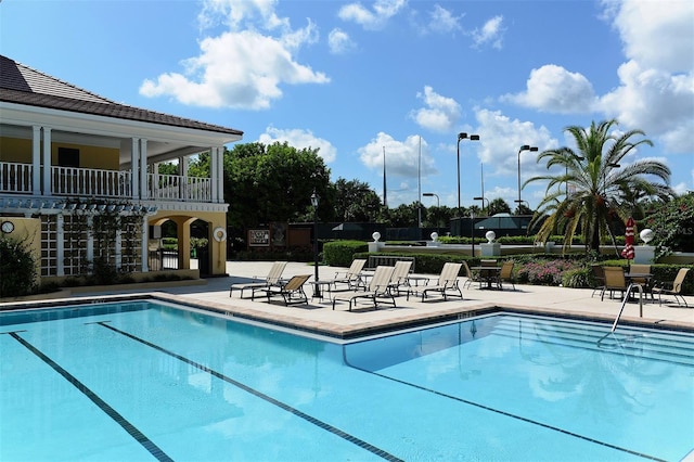 view of pool featuring a patio area