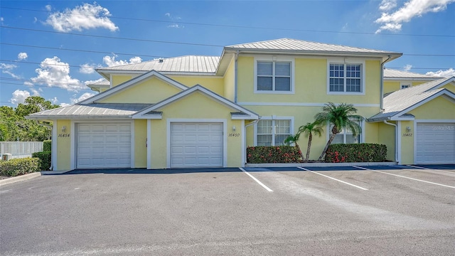 16450 Gloria Ln Unit 105, Nokomis, FL 34275 - view of front of property with a garage