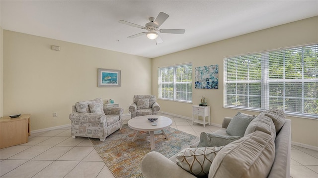 tiled living room featuring ceiling fan