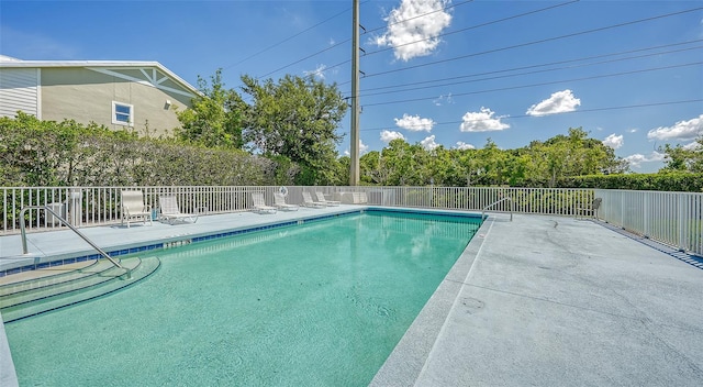 view of pool with a patio