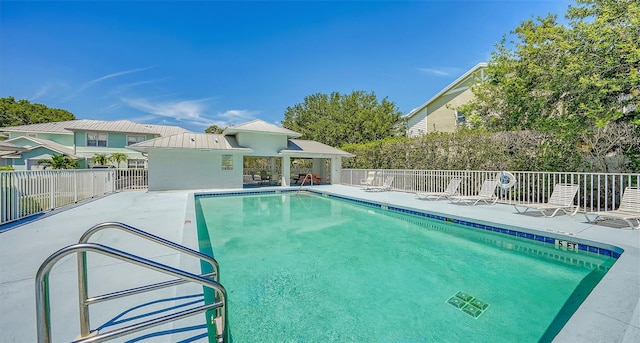 view of pool featuring a patio