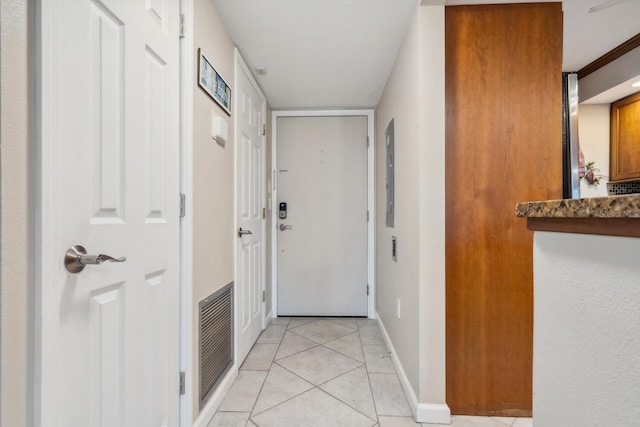 hallway with light tile floors