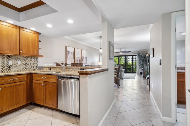 kitchen featuring light stone countertops, ceiling fan, dishwasher, light tile flooring, and ornamental molding