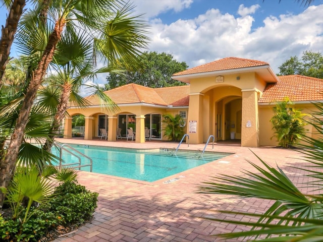 view of pool with a patio