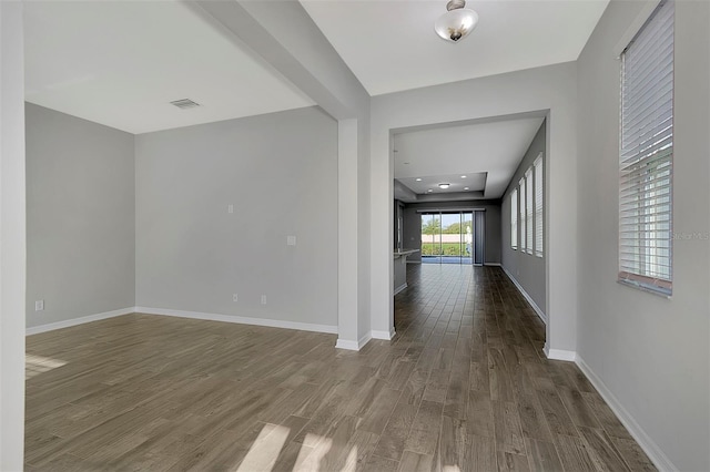 interior space with dark wood-type flooring