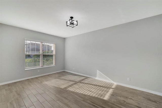 unfurnished room featuring light hardwood / wood-style floors