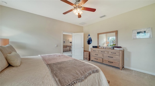 carpeted bedroom featuring ceiling fan and lofted ceiling