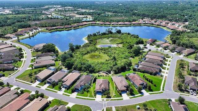 birds eye view of property featuring a water view