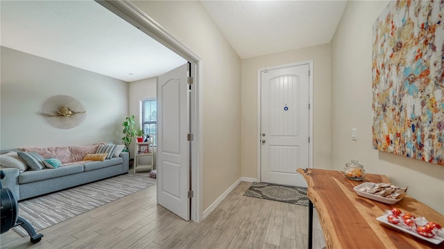 entrance foyer with light hardwood / wood-style floors