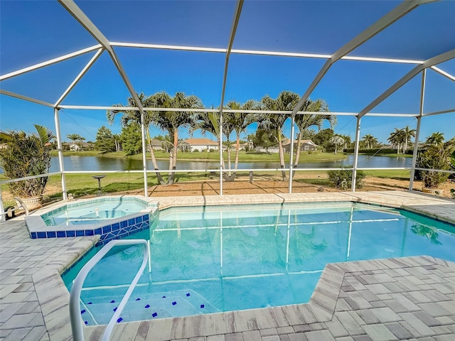 view of pool featuring a water view, glass enclosure, a pool with connected hot tub, and a patio area