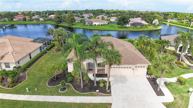 aerial view with a residential view and a water view