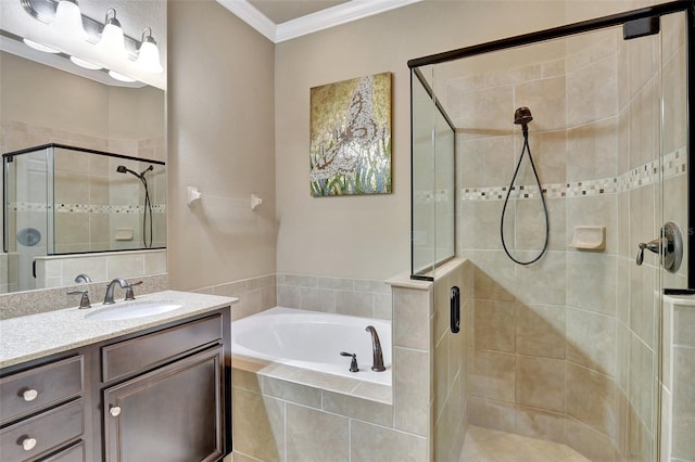 bathroom featuring vanity, ornamental molding, and shower with separate bathtub