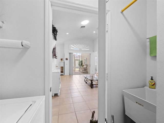 interior space featuring tile patterned flooring and sink