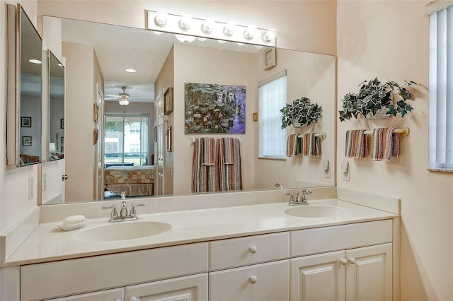 bathroom featuring vanity and ceiling fan