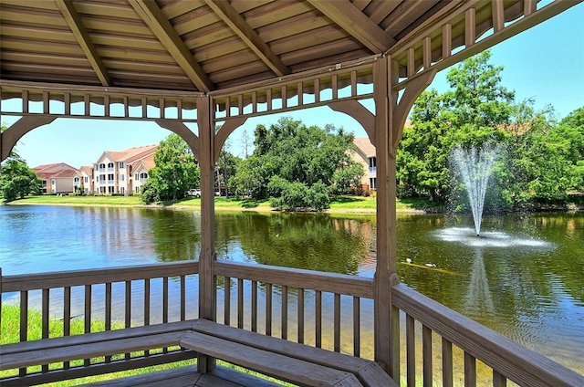 exterior space with a water view