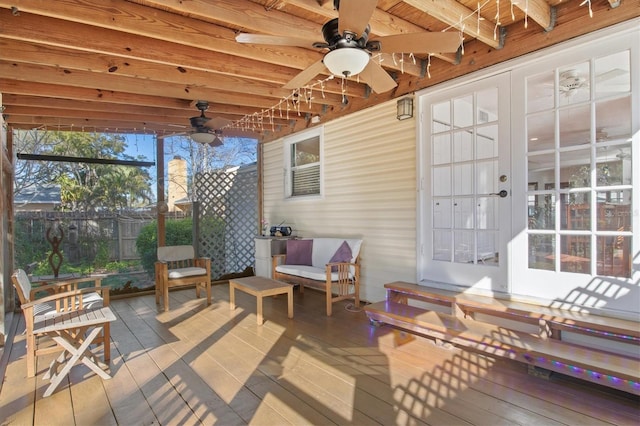 wooden deck with ceiling fan