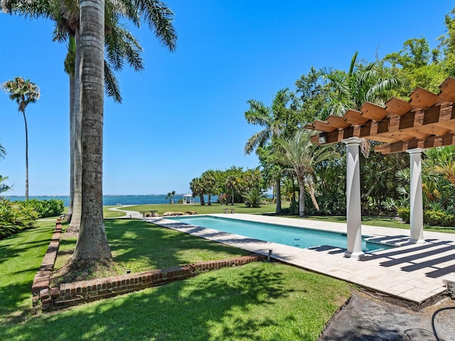 4521 Bay Shore Rd, Sarasota, FL 34234 - view of swimming pool with a pergola and a yard