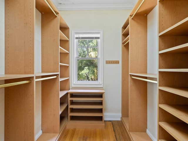 4521 Bay Shore Rd, Sarasota, FL 34234 - walk in closet featuring wood finished floors