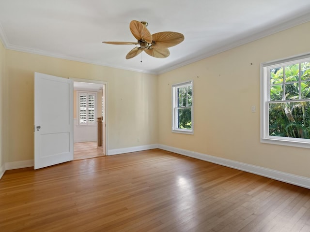 4521 Bay Shore Rd, Sarasota, FL 34234 - spare room featuring light wood finished floors, baseboards, and crown molding