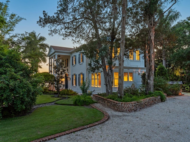 4521 Bay Shore Rd, Sarasota, FL 34234 - neoclassical / greek revival house featuring a front yard