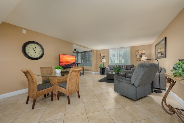 dining room featuring ceiling fan and light tile patterned floors