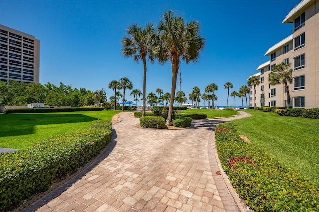 5920 Midnight Pass Rd Unit 104, Sarasota, FL 34242 - surrounding community with a yard