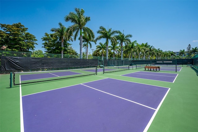 view of tennis court featuring basketball court