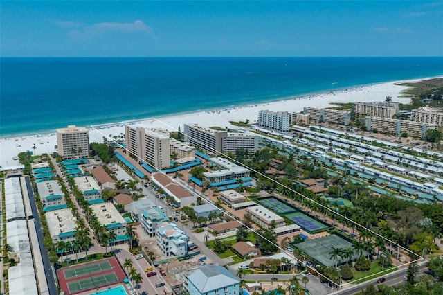 aerial view with a view of the beach and a water view