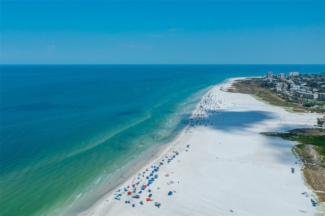 aerial view featuring a water view and a beach view